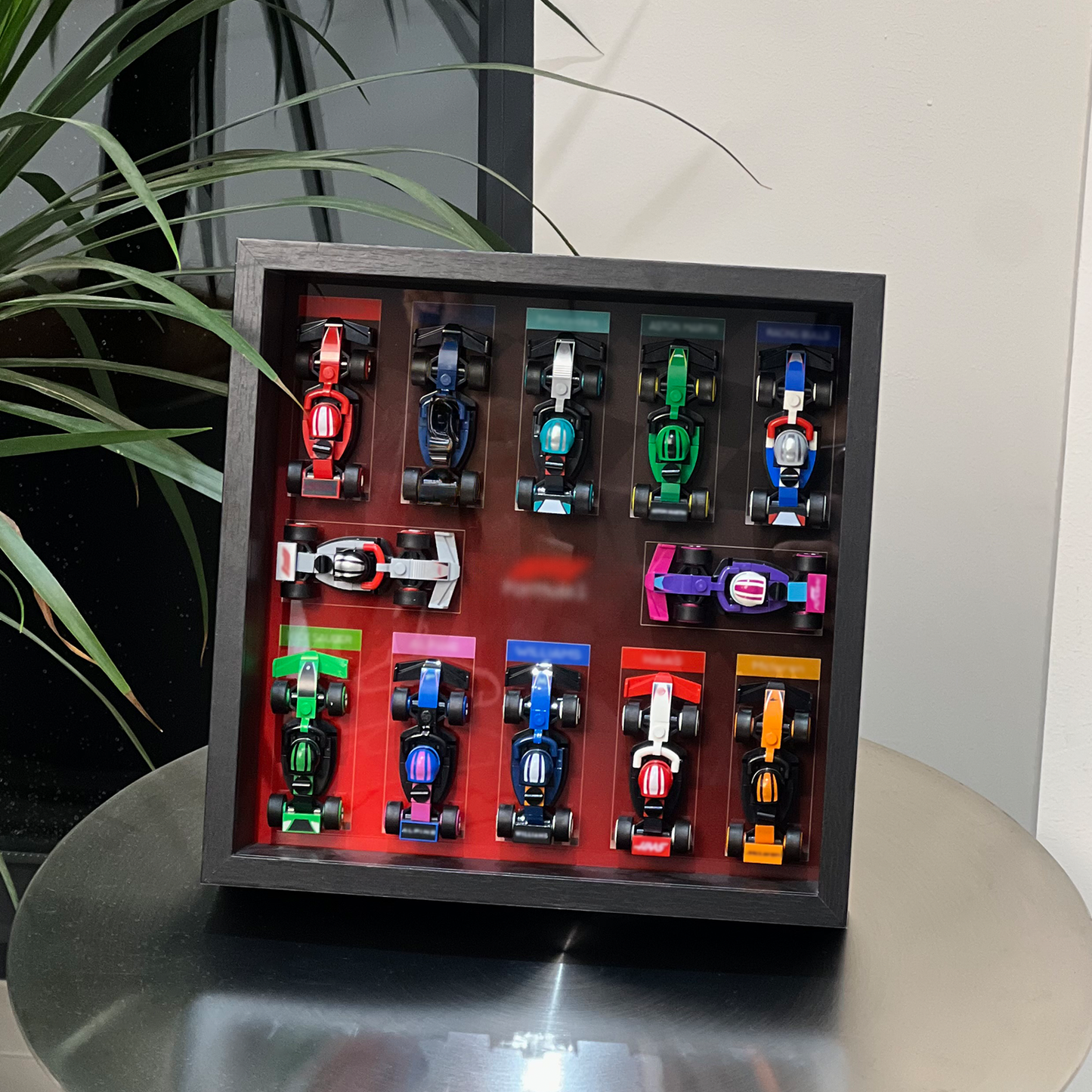 iLuane Display Wallboard for Lego Surprise Collectible Race Cars 66796, Holds 12 Cars on One Frame, Adult Collectibles Wall Mount, Home or Office Décor, Black (No Car Included)