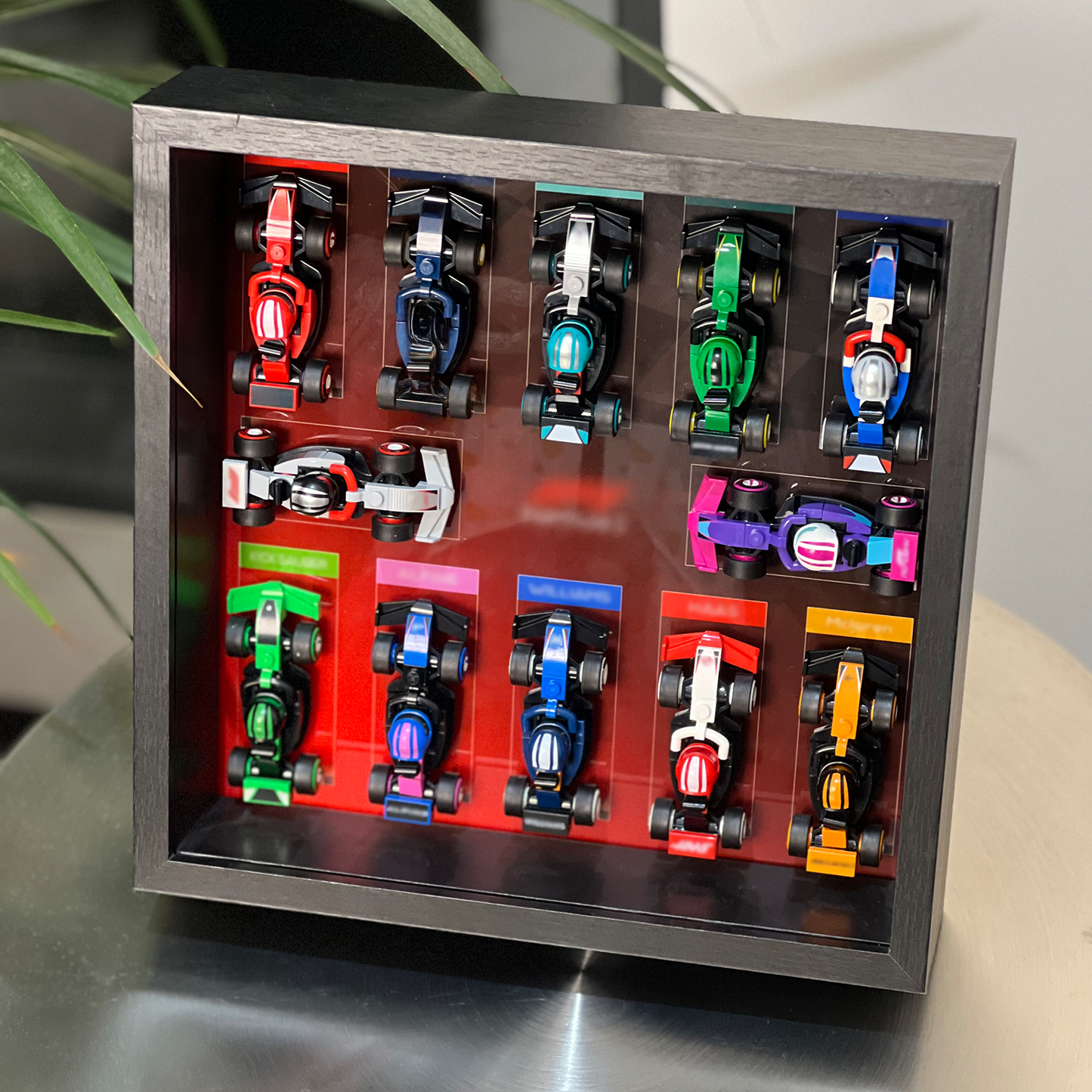 iLuane Display Wallboard for Lego Surprise Collectible Race Cars 66796, Holds 12 Cars on One Frame, Adult Collectibles Wall Mount, Home or Office Décor, Black (No Car Included)